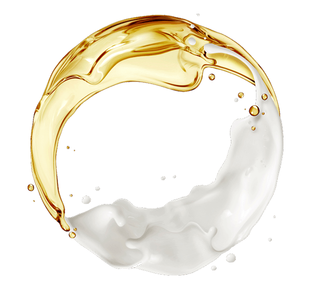 A gold and white circle with a splash of milk.