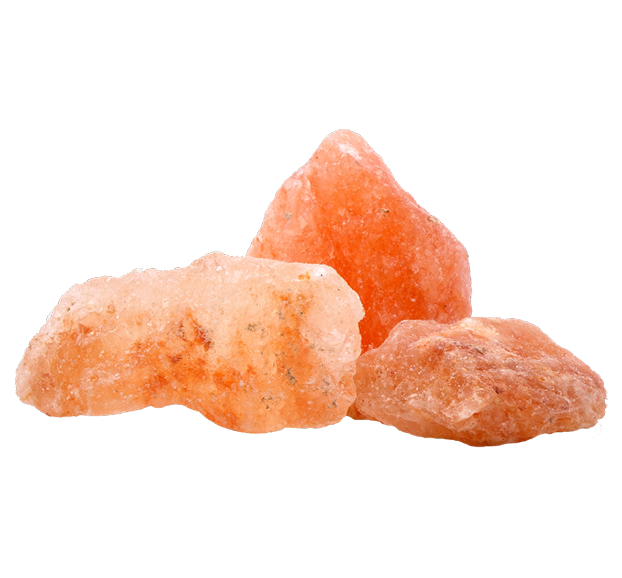 Three pieces of orange salt on a white background.